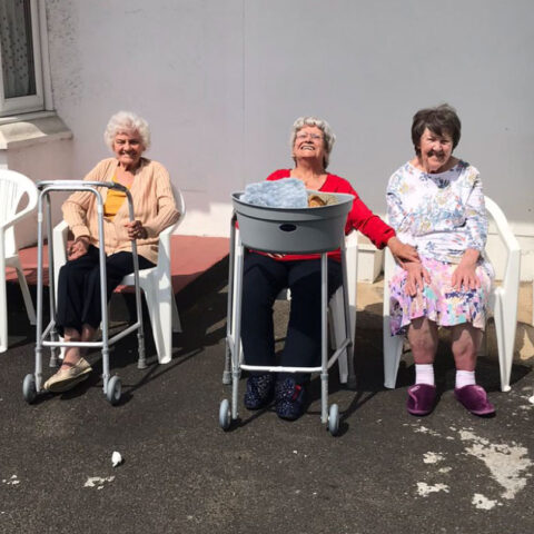 Residents outside enjoying sun