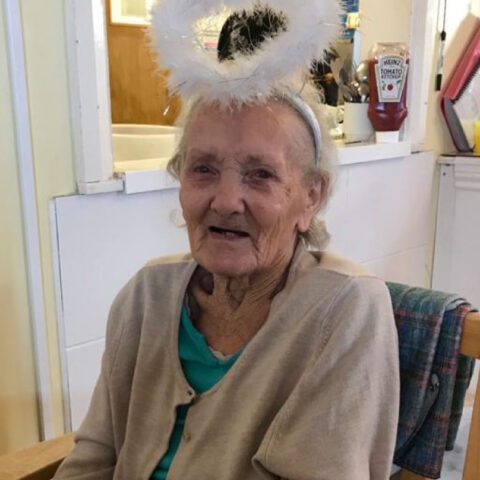 Residents with party hat on