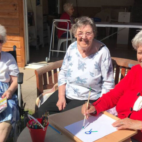 Residents doing craft lessons